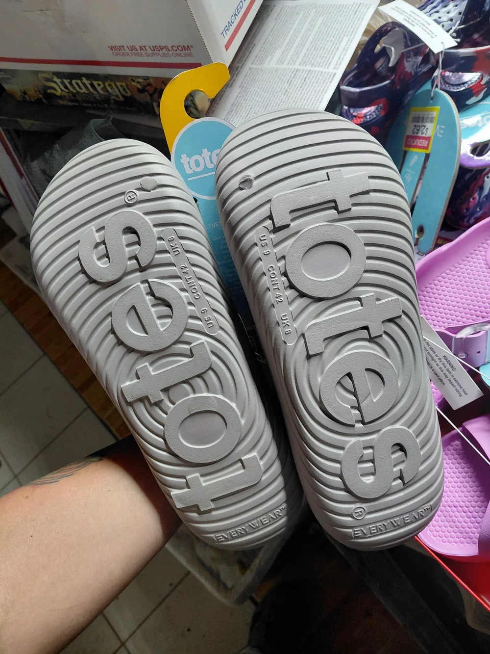 are grey Totes slide sandals featuring a textured honeycomb footbed men's size 9